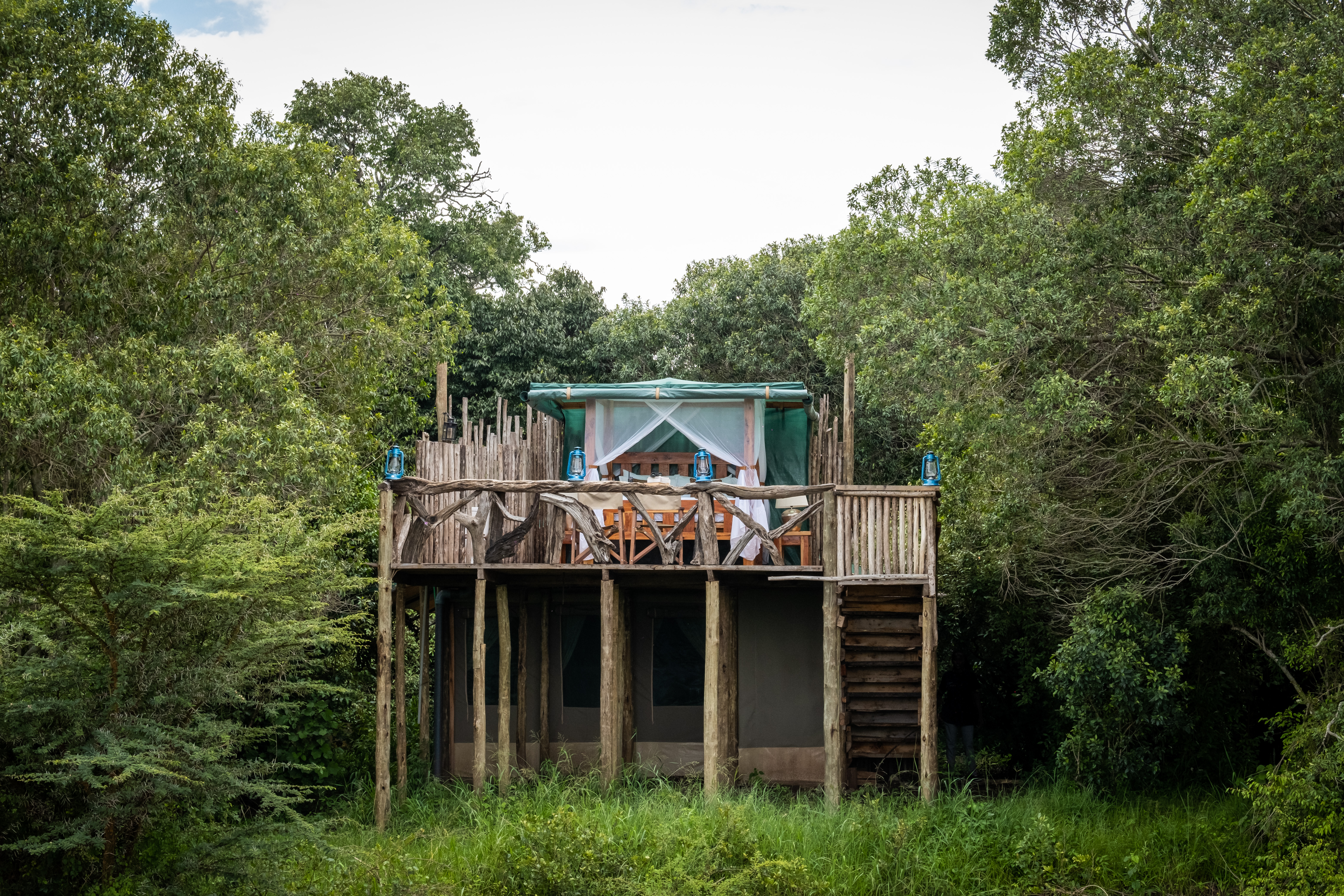 The Enkakenya Starbed — elevated on timber stilts above the riverine forest